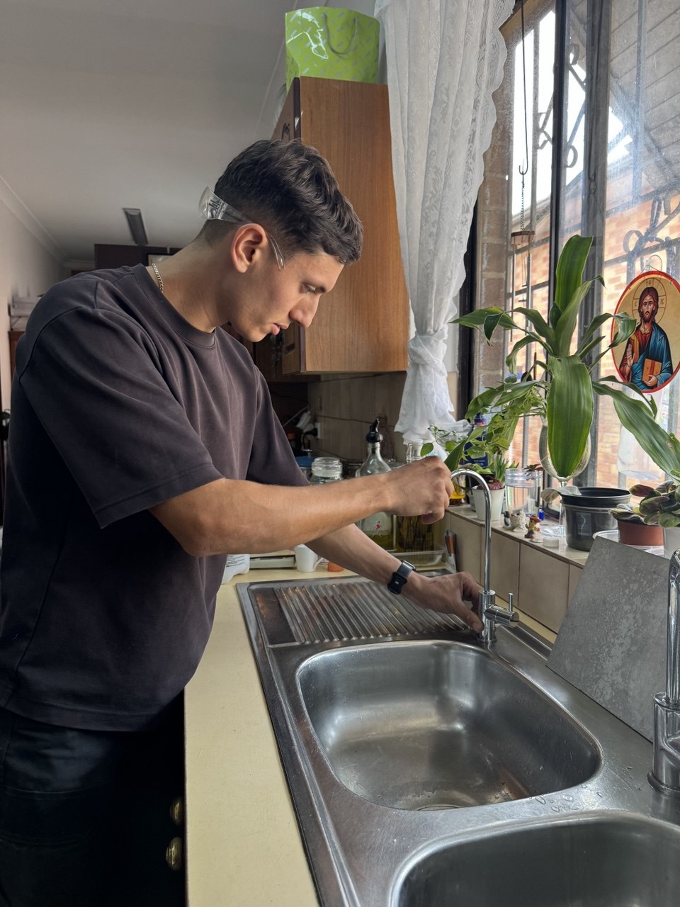 Filters For You plumber finalising water filter install Sydney