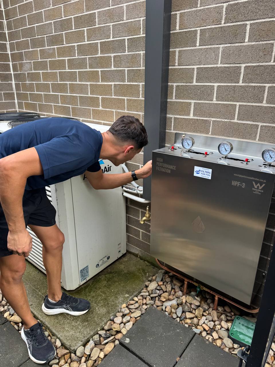 Jean-Paul completing whole house water filter installation Sydney
